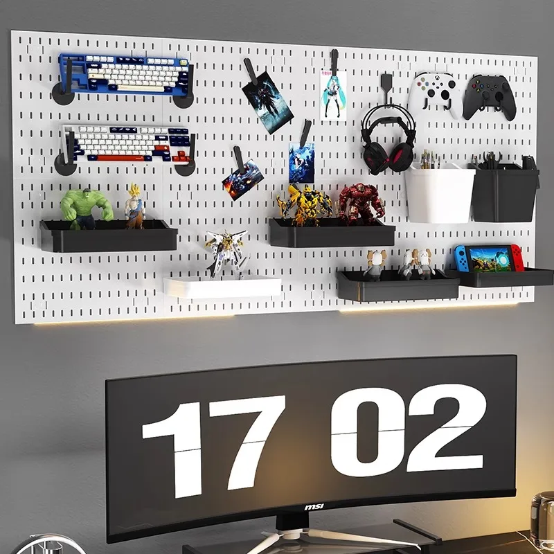 Wall-mounted cable management for organized gaming accessories and collectibles.