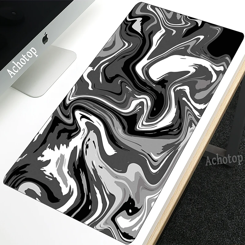 Swirling monochrome mouse pad design, a chic accessory for any hockey table gaming room.