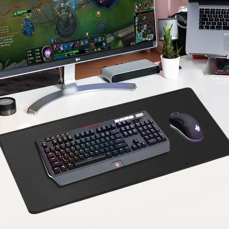 Large gaming desk mat for smooth mouse movement, ideal for a table in pub gaming setup.